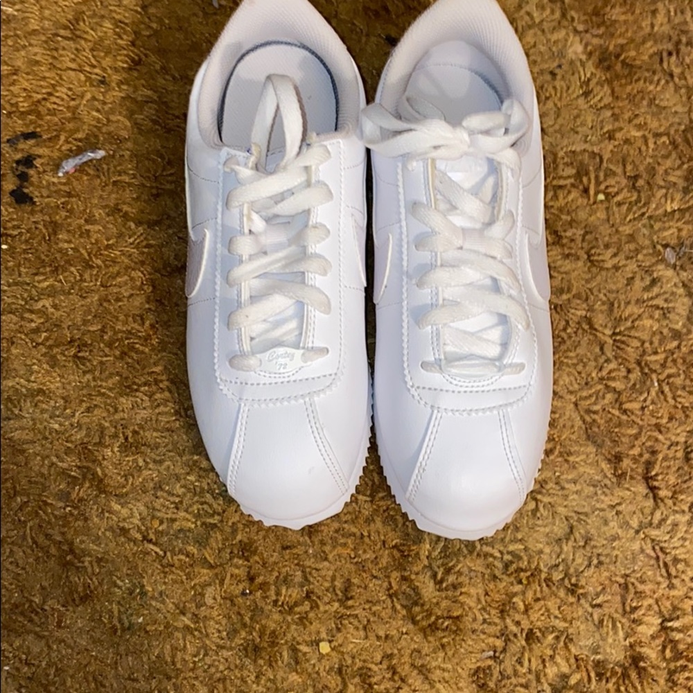 All white Nike Cortez